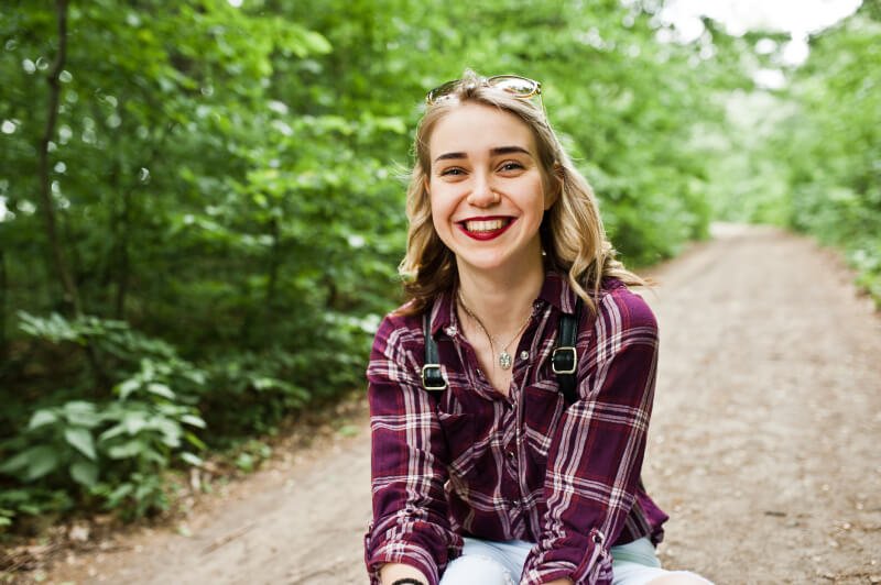 a person smiling outside